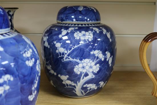 A pair of Chinese blue and white ginger jars and covers and a pair of vases